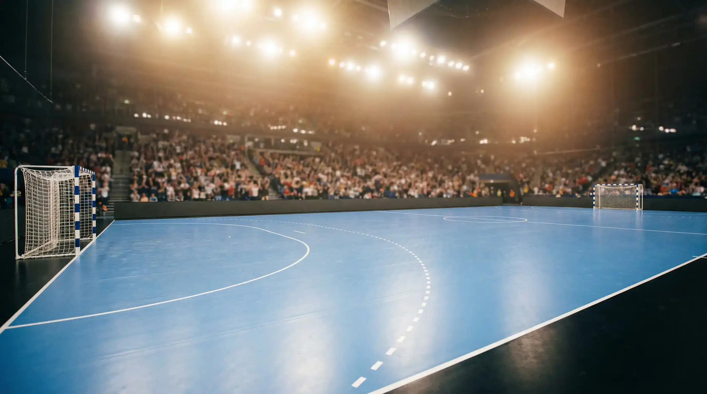 Handball-Spielfeld mit Ball und Toren – Symbolbild zur CL-Gruppenphase 2025/26